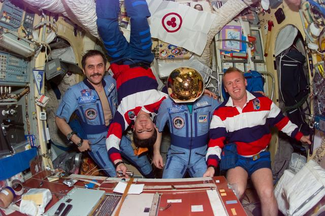 NASA image: STS-89 and Mir 24 crewmembers pose on Base Block
