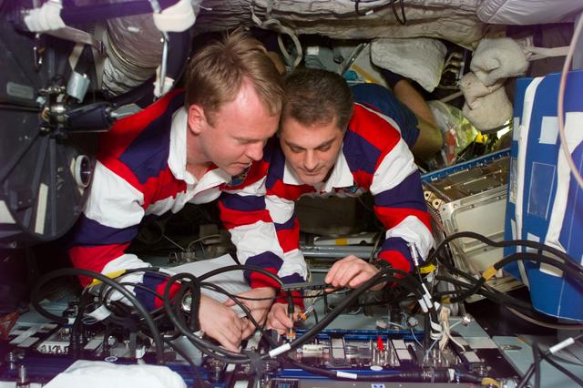 NASA image: MS Wolf instructs MS Thomas in the operation of Cocult