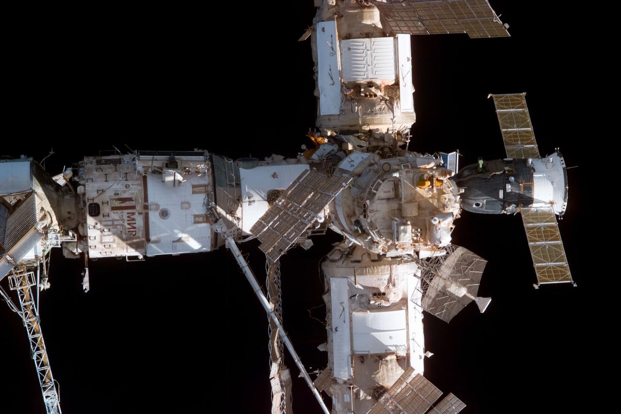 S89-E-5387 (29 Jan 1998) --- This Electronic Still Camera (ESC) image shows most of the elements of Russia's Mir Space Station. The view taken from onboard the Space Shuttle Endeavour during relative separation of the two spacecraft following undocking operations.  Thus ending the eighth Shuttle/Mir joint docking mission.  This ESC view was taken on January 29, 1998, at 14:46:24 MET.