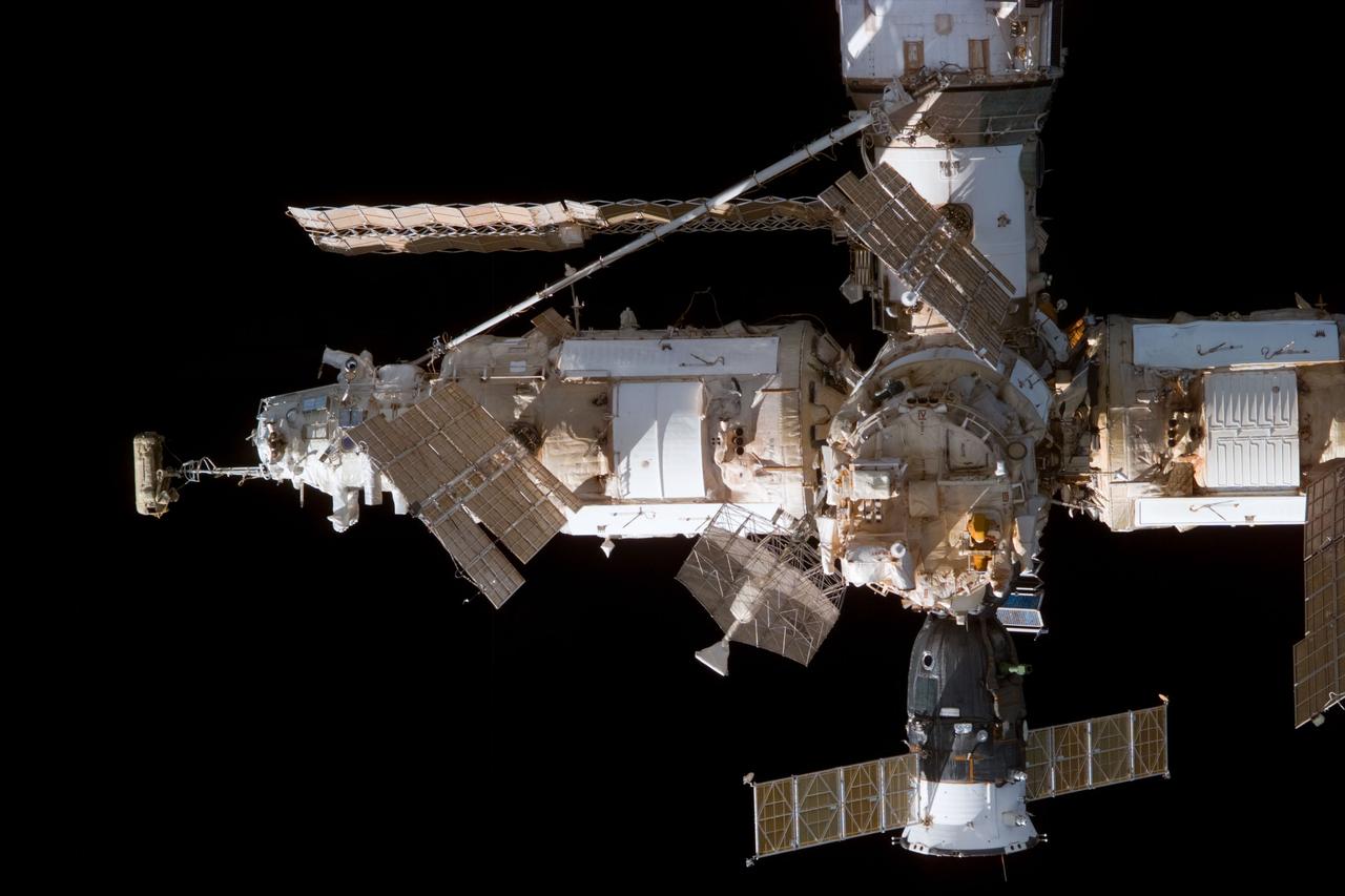 S89-E-5390 (29 Jan 1998) --- This Electronic Still Camera (ESC) image shows most of the elements of Russia's Mir Space Station. The view taken from onboard the Space Shuttle Endeavour during relative separation of the two spacecraft following undocking operations.  Thus ending the eighth Shuttle/Mir joint docking mission.  This ESC view was taken on January 29, 1998, at 14:46:47 MET.