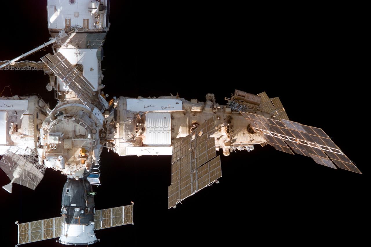 S89-E-5391 (29 Jan 1998) --- This Electronic Still Camera (ESC) image shows most of the elements of Russia's Mir Space Station. The view taken from onboard the Space Shuttle Endeavour during relative separation of the two spacecraft following undocking operations.  Thus ending the eighth Shuttle/Mir joint docking mission.  This ESC view was taken on January 29, 1998, at 14:46:58 MET.