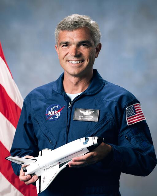 NASA image: Official portrait of Michael R. U. Clifford