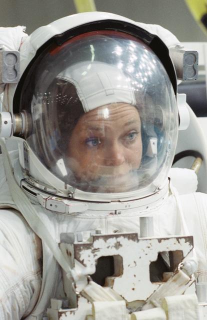 NASA image: STS-40 MS Jernigan wearing EMU prepares for a simulation in JSC's WETF pool