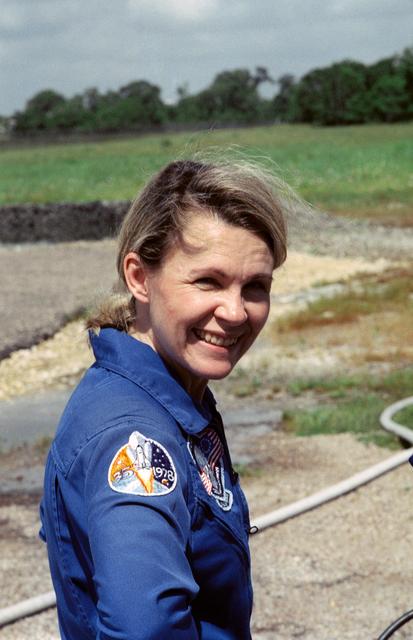 NASA image: STS-40 MS Seddon pauses during fire fighting training at JSC's Fire Pit