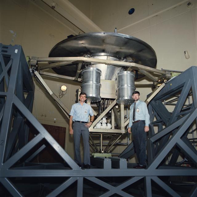 NASA image: Astronaut Ronald Sega with Wake Shield Facility on test stand at JSC