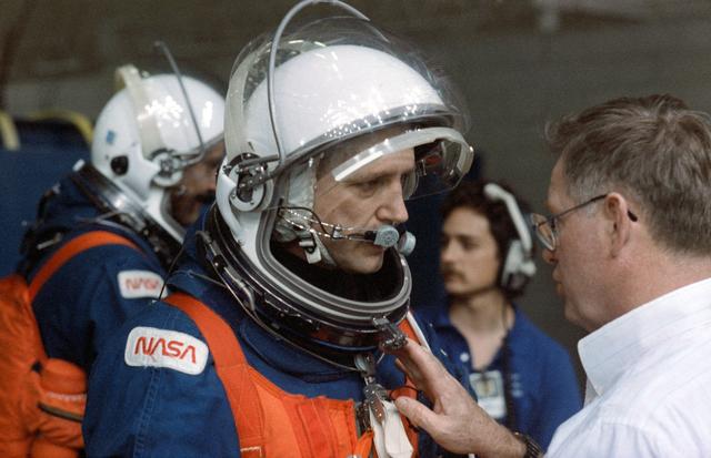 NASA image: STS-49 MS Akers listens to instructions prior to JSC WETF bailout exercises