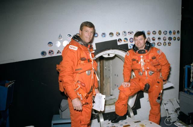 NASA image: STS-56 Commander Cameron & Pilot Oswald at CCT hatch during JSC training