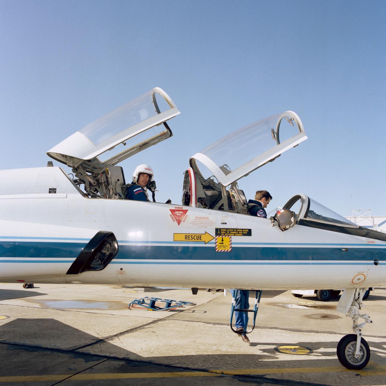Seated in the rear station of a NASA T-38 jet trainer aircraft, Russian Cosmonaut Sergei Krikalev prepares to take a familiarization flight.