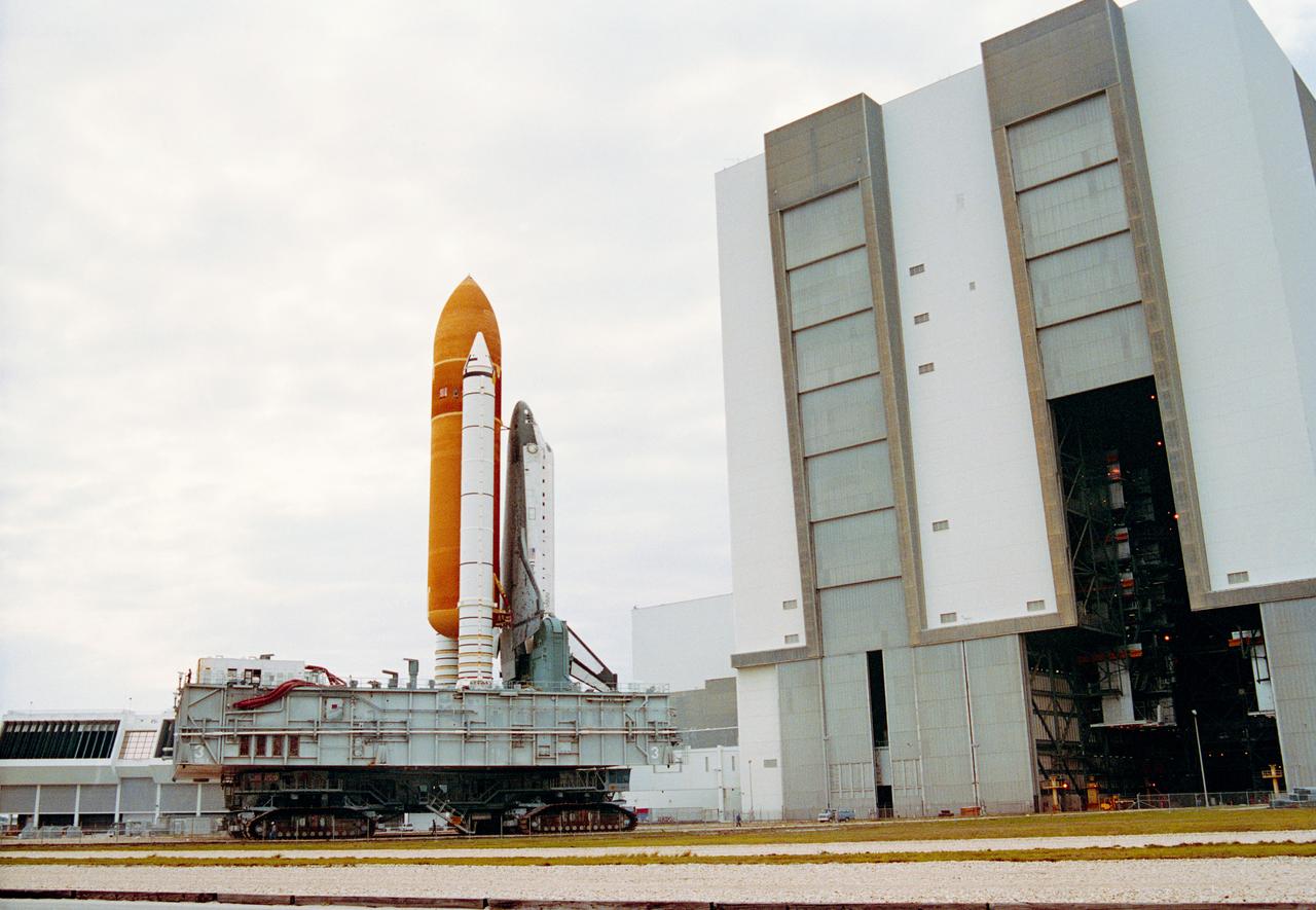 S93-29846 (2 Feb 1993) --- The orbiter Columbia is rolled out of the Vehicle Assembly Building (VAB).  Having completed its assembly with the external tank and solid rocket boosters, the Space Shuttle will be rolled out to Launch Pad 39A, where it is targeted for liftoff on Space Shuttle Mission STS-55 in late February.