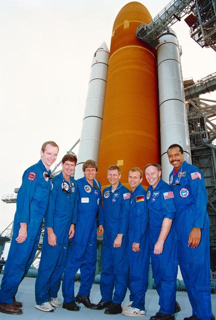 STS-55 SL-D2 crew poses in front of ET/SRB at KSC Launch Complex (LC) Pad 39A