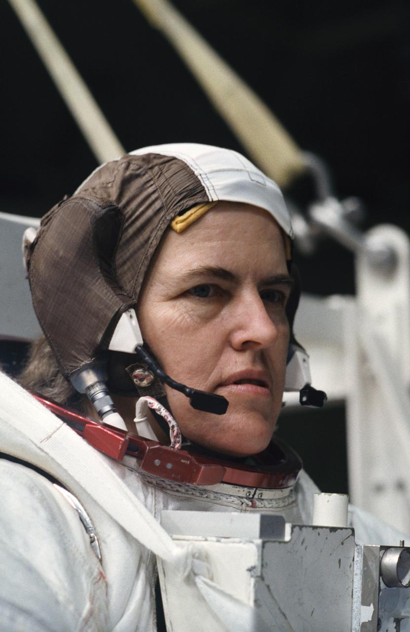 S93-31697 (3 April 1993) --- Astronaut Shannon W. Lucid participates in training for contingency Extravehicular Activity (EVA) for the STS-58 mission.  Behind Lucid, sharing a moveable platform with her, is astronaut David A. Wolf (out of frame).  For simulation purposes, the two mission specialists were about to be submerged to a point of neutral buoyancy in the Johnson Space Center's (JSC) Weightless Environment Training Facility (WET-F).  Though the Spacelab Life Sciences (SLS-2) mission does not include a planned EVA, all crews designate members to learn proper procedures to perform outside the spacecraft in the event of failure of remote means to accomplish those tasks.