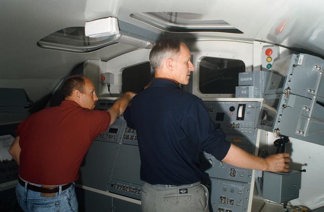 NASA image: STS-61 crewmembers training with the Remote Manipulator System