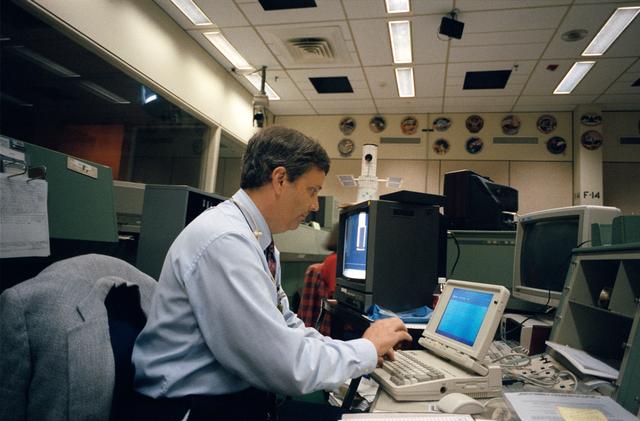 NASA image: Flight Director works out problem during STS-61 simulations