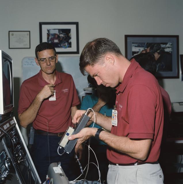 NASA image: Members of STS-58 crew training with amateur radio equipment at JSC