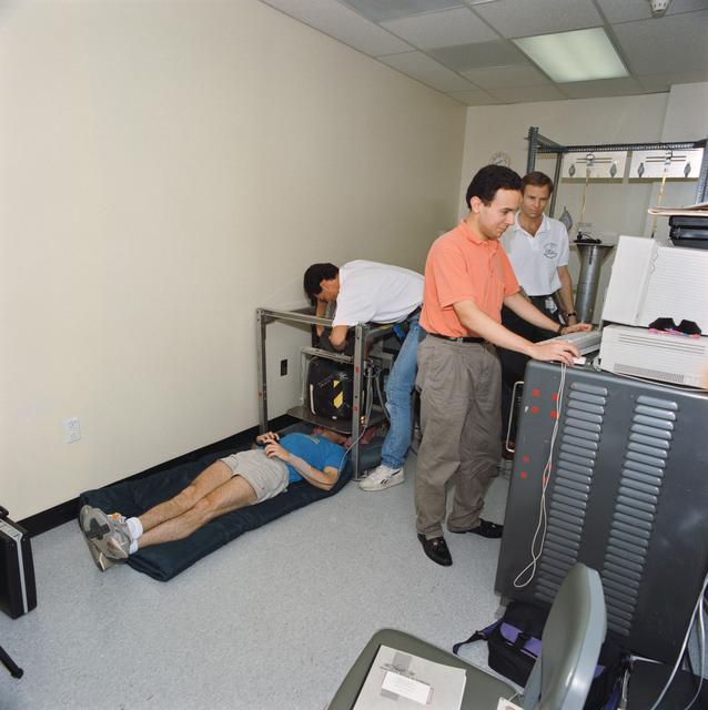 NASA image: STS-58 crewmembers participate in baseline data collection