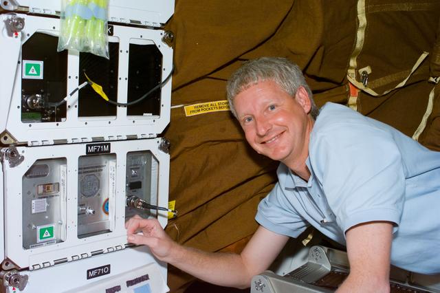 NASA image: MEMS,Hawley floats next to the middeck locker