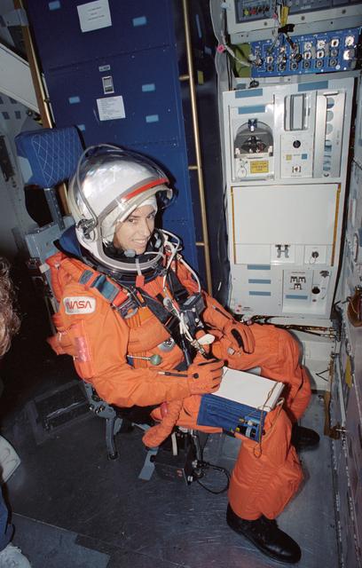 NASA image: Astronaut Ellen Ochoa in middeck during launch/entry training