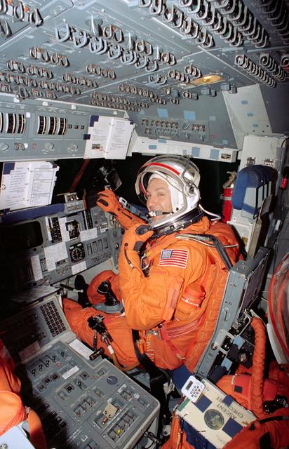 Astronaut Curtis Brown on flight deck mockup during training