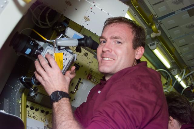 NASA image: Cmdr Halsell videotapes experiment in Spacelab module