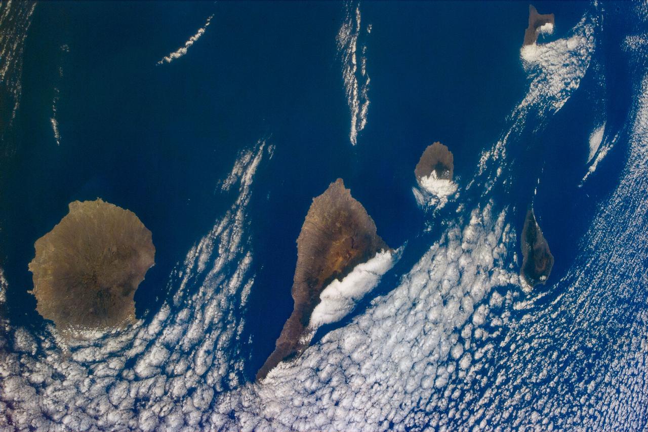 S94-E-5059 (July 1997) --- Several islands in the Canary chain and the cloud formations that are generally associated with this chain were captured with the STS-94 electronic still camera (ESC) in this nadir view from the Space Shuttle Columbia.