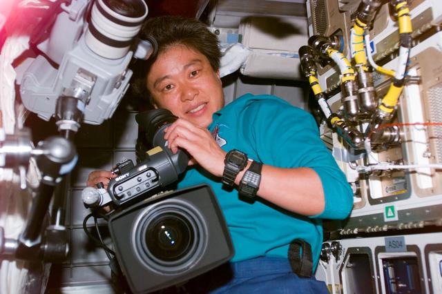 Mukai in Spacehab with cameras