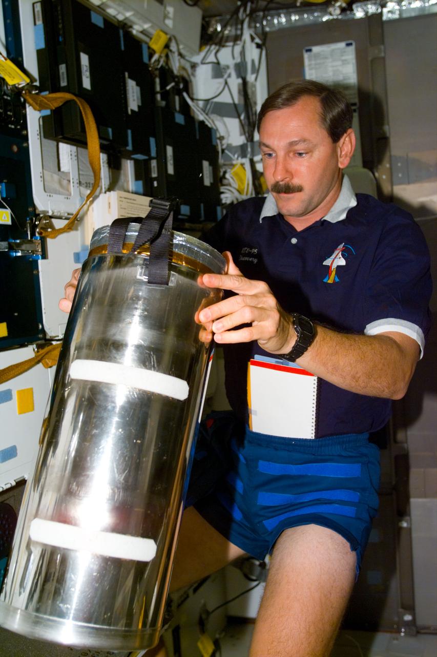 STS095-E-5171 (2 Nov. 1998) --- Astronaut Curtis L. Brown, STS-95 commander, during Flight Day 3 activity aboard the Space Shuttle Discovery. The photo was taken with an electronic still camera (ESC) at 05:57:03 GMT, Nov. 2.