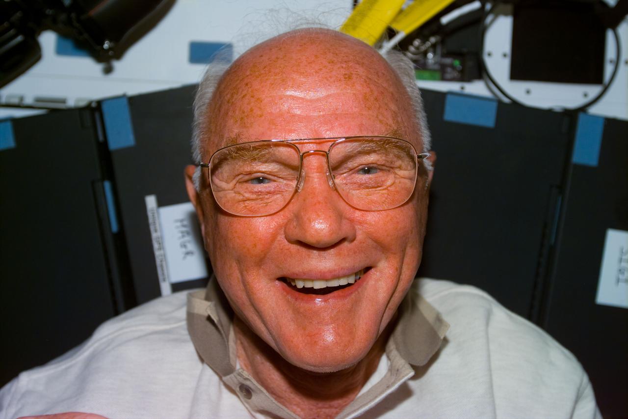 STS095-E-5191 (31 Oct. 1998) --- Judging by his countenance, U.S. Sen. John H. Glenn Jr., appears to be enjoying his second trip into space following a 36-year span since his first trip. The photograph was taken with an electronic still camera (ESC) at 04:47:53 GMT, Oct. 31.
