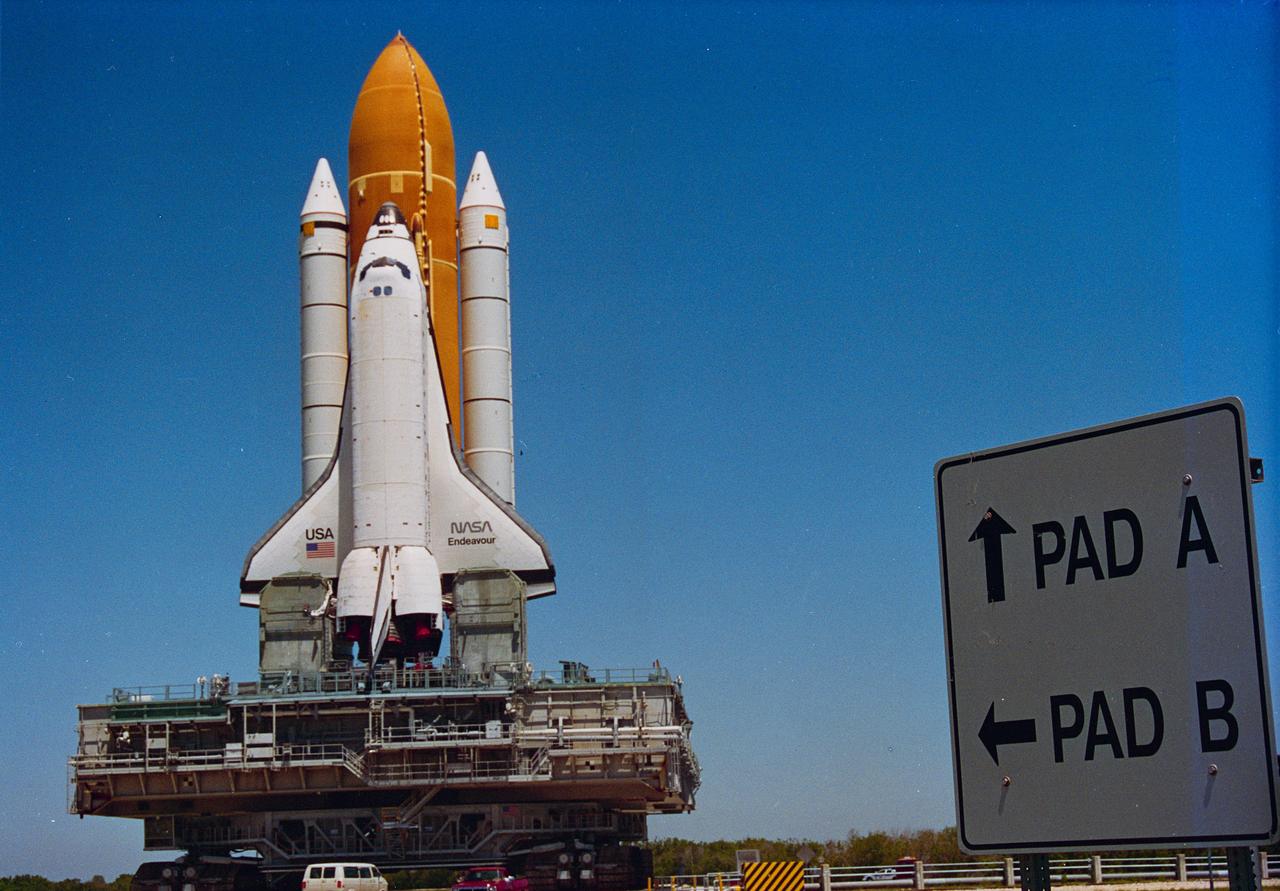 S96-07957 (16 April 1996) --- A road sign points to Launch Pad 39B, the final earthly destination for the Space Shuttle Endeavour and its final stepping stone into space.  Endeavour began the slow journey from the Vehicle Assembly Building (VAB) at about 10:00a.m., April 16, 1996, perched atop the Mobile Launcher Platform and carried by the Crawler-Transporter.  Upcoming activities at the pad to prepare Endeavour for flight on STS-77 include installation of the payloads in the Orbiter?s payload bay.
