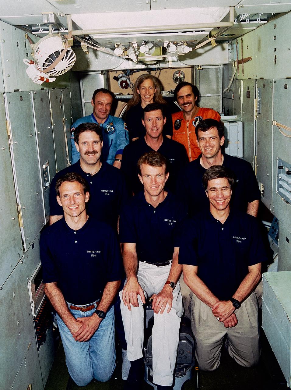 S96-10557 (May 1996) --- The original Mir-22 crew assigned to duty aboard Russia's Mir Space Station poses with the STS-81 crew. The cosmonauts, flanking astronaut Marsha S. Ivins on the top row, are Gennadiy M. Manakov (left) mission commander; and Pavel V. Vinogradov, flight engineer. After this photo was taken, a shift of Russian crew assignments occurred and Manakov and Vinogradov were replaced with Valeri G. Korzun and Aleksandr Y. Kaleri. The astronauts are, front row (left to right): Jerry M. Linenger, Brent W. Jett, Jr., and John E. Blaha. Second row, left to right, John W. Grunsfeld, Michael A. Baker and Peter J. K. (Jeff) Wisoff. All the STS-81 crewmembers except Blaha are scheduled to be launched in December 1996 aboard the Space Shuttle Atlantis and those six will be joined by Mir-22 cosmonaut researcher Blaha when the two spacecraft are joined in Earth-orbit. Blaha will have been launched into Earth-orbit to connect with Russia's Mir Space Station on an earlier mission - STS-79 - of the space shuttle Atlantis, scheduled for launch in the summer of 1996. Linenger will remain onboard Mir for a tour of duty as a cosmonaut researcher.