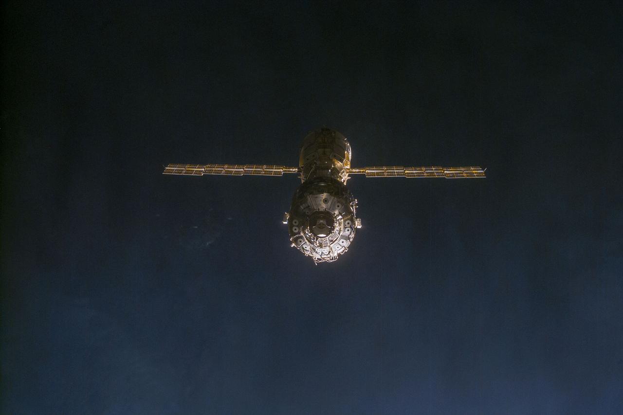 S96-E-5036 (29 May 1999) --- The International Space Station (ISS) is only moments away from its docking with the Space Shuttle Discovery in this electronic still camera's view from Discovery's flight deck. The image was photographed at 03:34:23 GMT, May 29, 1999.