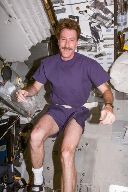 NASA image: Kent Rominger exercises on middeck