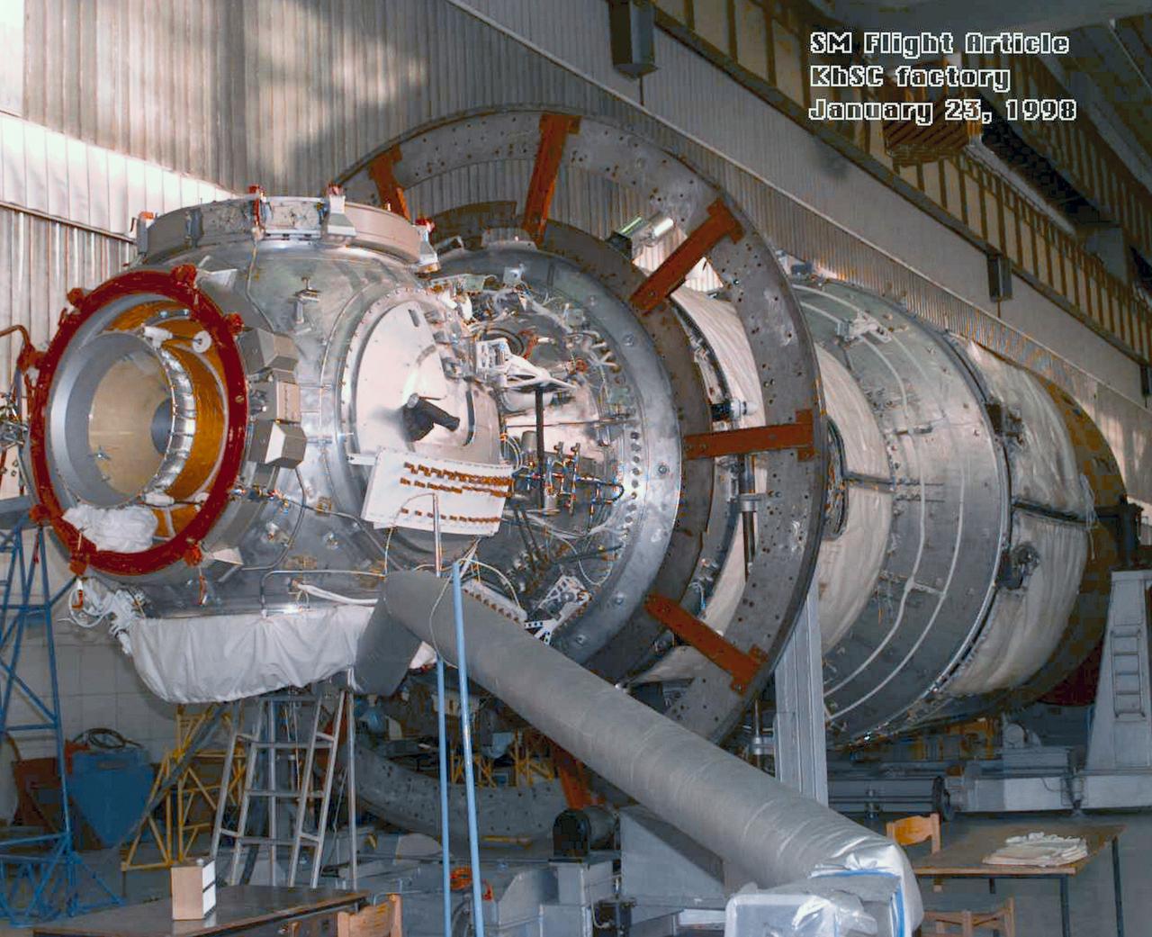 S98-04906 (23 Jan. 1998) --- A three-quarter frontal view of the flight article of the Service Module (SM) for the International Space Station (ISS).  The first fully Russian contribution to ISS, the SM will provide early power, propulsion, life support, communications and living quarters for the station. It will be the third station element to be launched and join the United States-funded, Russian-built Functional Cargo Block (FGB) and the United States connecting module Node 1 in orbit.