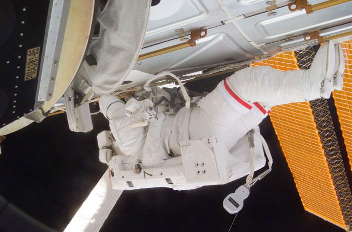 STS98-E-5230 (14 February 2001) ---  Astronaut Thomas D. Jones, mission specialist, participates in the final of three STS-98/5a space walks to perform work on the International Space Station (ISS).  The scene was photographed from the Space Shuttle Atlantis' crew cabin with a digital still camera.