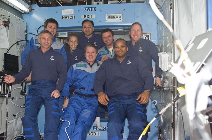 STS98-E-5276 (15 February 2001) ---  Six NASA astronauts and two Russian cosmonauts pose for a group portrait  representing both shuttle and station crews near the end of several days of joint work aboard the International Space Station (ISS).  In front, from the left, are astronauts Kenneth D. Cockrell, STS-98 commander; William M. (Bill) Shepherd, Expedition One commander; and Robert L. Curbeam, STS-98 mission specialist.  In the rear, from the left, are cosmonaut Sergei K. Krikalev, Expedition One flight engineer; astronaut Marsha S. Ivins, STS-98 mission specialist; astronaut Mark L. Polansky, shuttle pilot; cosmonaut Yuri P. Gidzenko, Soyuz commander for Expedition One;  and astronaut Thomas D. Jones, shuttle mission specialist.