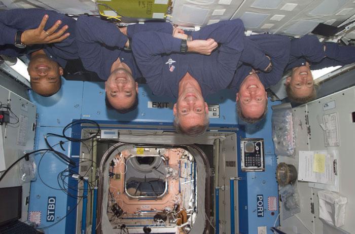 STS98-E-5284 (15 February 2001) ---   These five astronauts take a break from Destiny laboratory installation work as they near an end to their several days' visit aboard the International Space Station (ISS). From the left are astronauts Robert L. Curbeam, Mark L. Polansky, Kenneth D. Cockrell, Thomas D. Jones and Marsha S. Ivins.  Their posed position might be termed &quot;upside down&quot; on Earth, but in their weightless environment the arrangement makes for no one-gravity complications like blood rushing to the head, etc. The scene was recorded with a digital still camera.