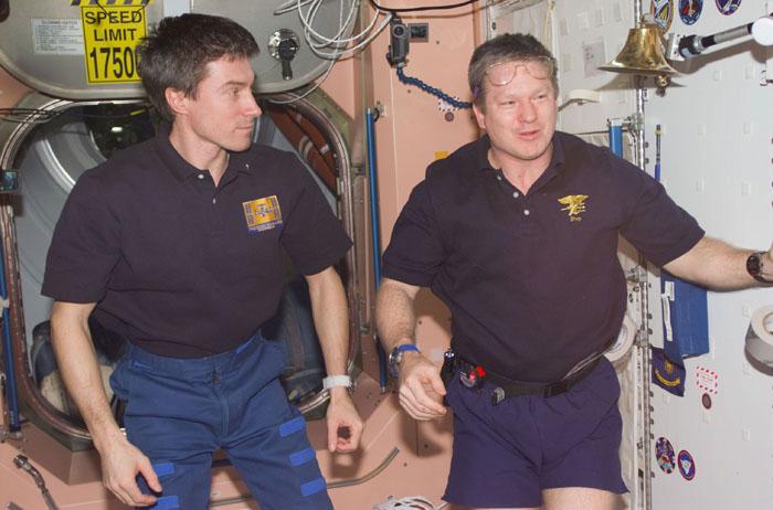 STS98-E-5291 (16 February 2001) ---  Cosmonaut Sergei K. Krikalev (left), Expedition One flight engineer representing the Russian Aviation and Space Agency, and astronaut William M. (Bill) Shepherd, Expedition One commander, look toward their astronaut visitors (out of frame), about to conclude their time on the outpost.   The scene was recorded with a digital still camera during farewells  in the Unity node.