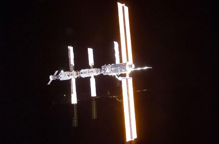 STS98-E-5305 (16 February 2001) --- The International Space Station (ISS) backdropped against the blackness of space following undocking. The photo was taken with a digital still camera.