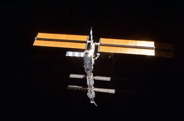 STS98-E-5308 (16 February 2001) --- The International Space Station (ISS) backdropped against the blackness of space following undocking. The photo was taken with a digital still camera.