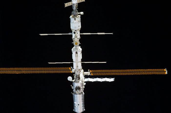 STS98-E-5317 (16 February 2001) --- The International Space Station (ISS) backdropped against the blackness of space following undocking. The photo was taken with a digital still camera.