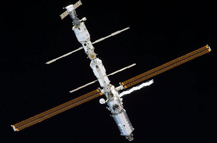 STS98-E-5319 (16 February 2001) --- The International Space Station (ISS) backdropped against the blackness of space following undocking. The photo was taken with a digital still camera.