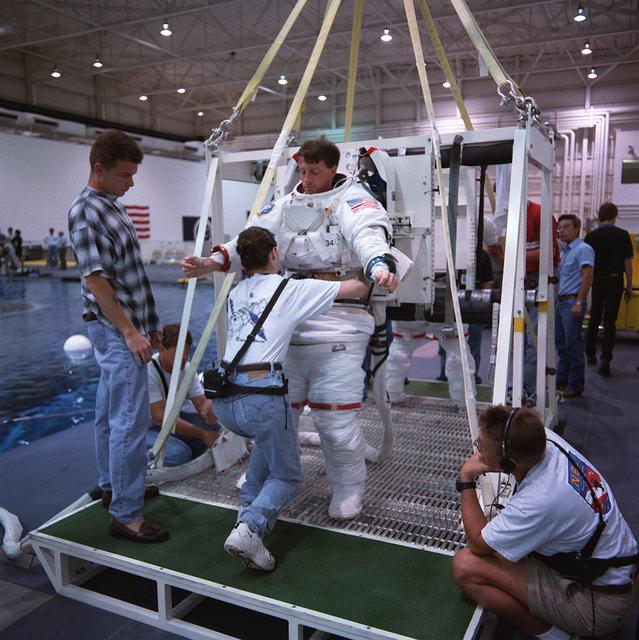NASA image: STS-103 crewmembers during NBL EVA training