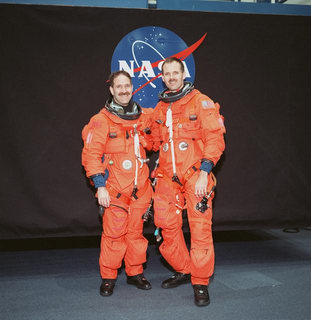 NASA image: STS-103 crewmembers participate in bailout training in building 9N