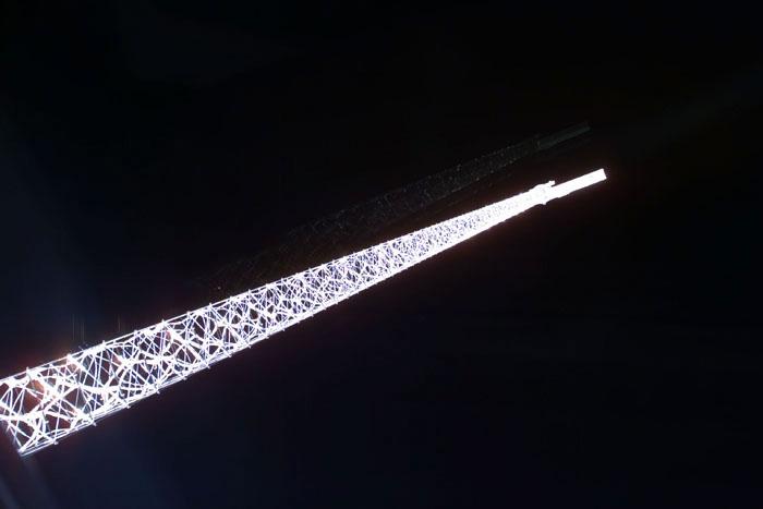 S99-E-5033 (12 February 2000) --- The 200 ft.-long mast supporting the Shuttle Radar Topography Mission juts into space from the Space Shuttle Endeavour (out of frame at left). The giant structure was deployed earlier today and the antennae on it quickly went to work mapping parts of Earth. By the time members of Endeavour's Red Team had reached lunchtime on this first full day in  space for the SRTM, the radar antennae in the payload bay and at the end of long mast had mapped about 1.7 million square miles (4.5 million square kilometers) of the Earth's surface, or the equivalent of about half the area of the United States. This photograph was taken with an electronic still camera (ESC) by a crew member inside Endeavour's cabin.