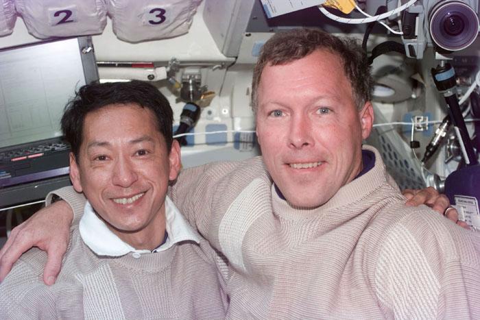 S99-E-5705 (18 February 2000) --- Astronauts Mamoru Mohri (left), mission specialist, and Dominic L. Gorie, pilot, on the flight deck of the Space Shuttle Endeavour. Mohri, representing Japan's National Space Development Agency (NASDA), and Gorie serve on the Blue Team for the scheduled 11-day mission  along with astronaut Janice Voss (out of frame).  A series of electronic stills was taken of the STS-99 crew members on the day they got the good news from flight controllers in Houston that Shuttle Radar Topograpy Mission (SRTM) mapping time had been extended.