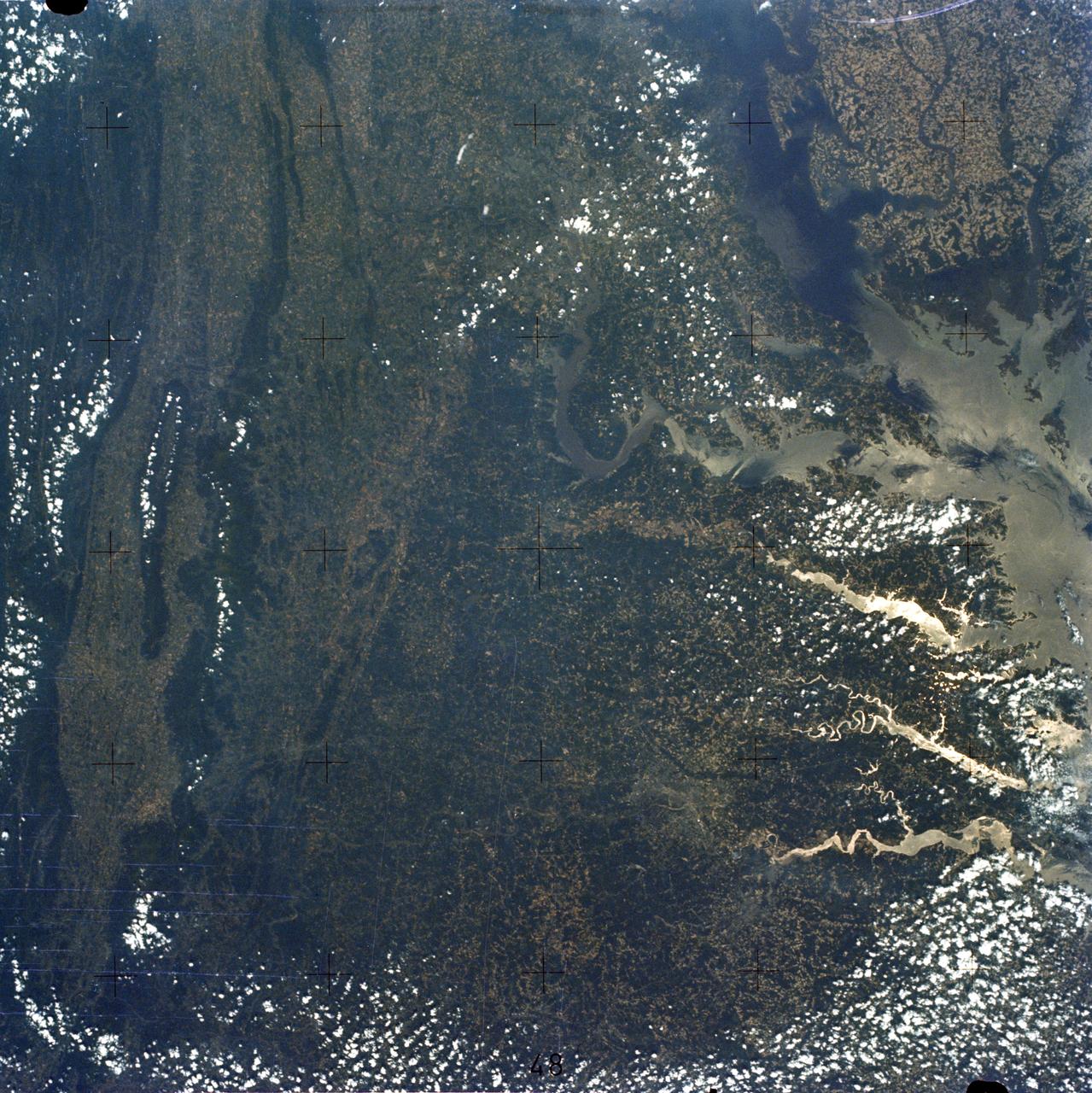 SL2-05-393 (22 June 1973) --- The nation's capital lies astride the Potomac River (38.5N, 77.5W) at the head of the Potomac Estuary. Baltimore, MD, also in the scene, is connected to Washington by the Baltimore-Washington Parkway. The suburbs of both cities tend to cluster around the Washington and Baltimore Beltways. Most of the countryside in the eastern two-thirds of this scene is either heavily forested or is in farming, dairy operations or poultry production. Photo credit: NASA