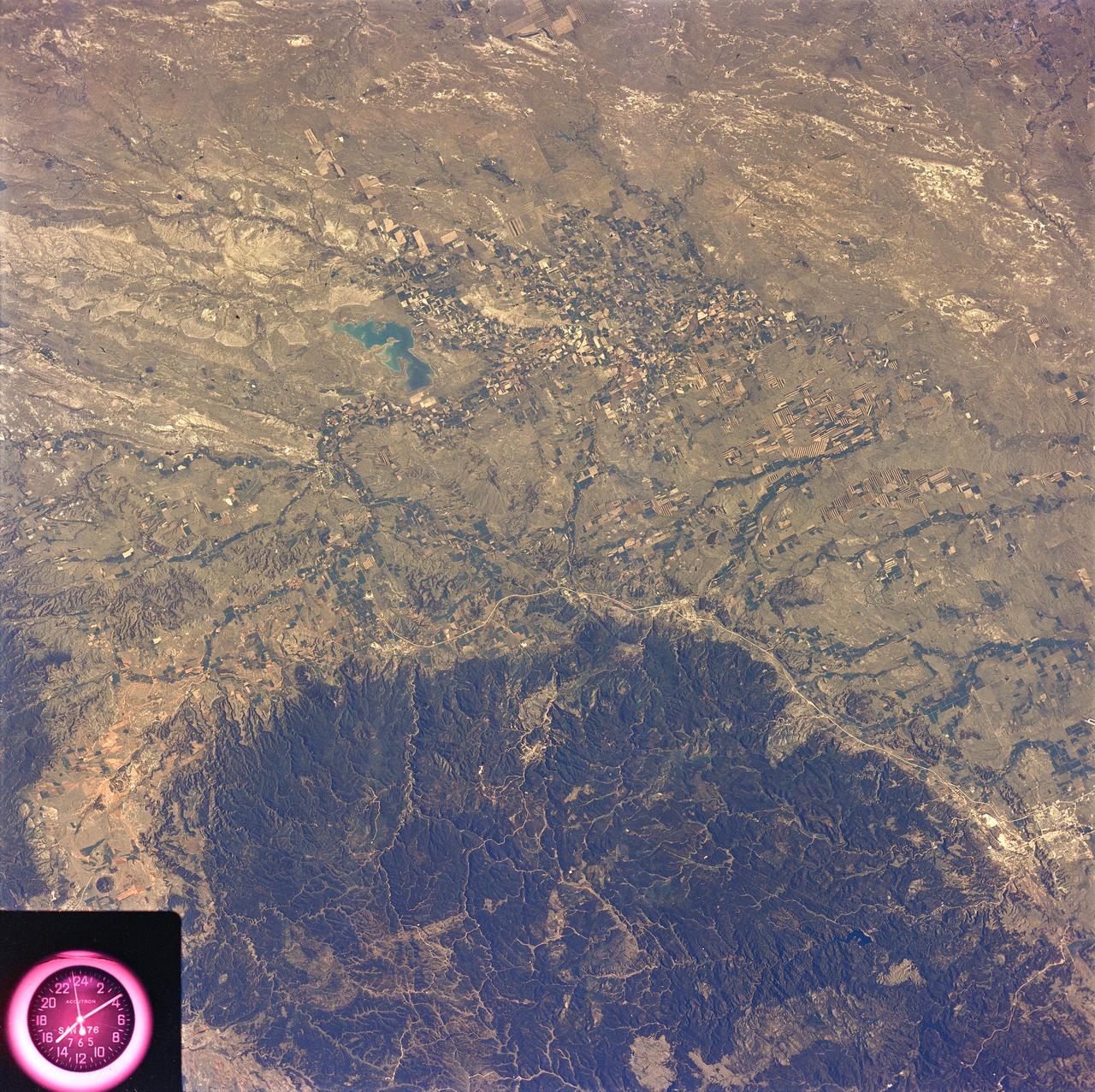 SL2-81-157 (22 June 1973) --- This view of the Black Hills Region, SD (44.0N, 104.0W) shows the scenic Black Hills where Mt. Rushmore and other monuments are located. Cities and towns in this view include: Rapid City, Deadwood, and Belle Fourche with the nearby Belle Fourche Reservoir. Notable in this scene are the recovering burn scars (seen as irregular shaped light toned patches) from a 1959 forest fire in the Black Hills National Forest near the edge of the photo. Photo credit: NASA