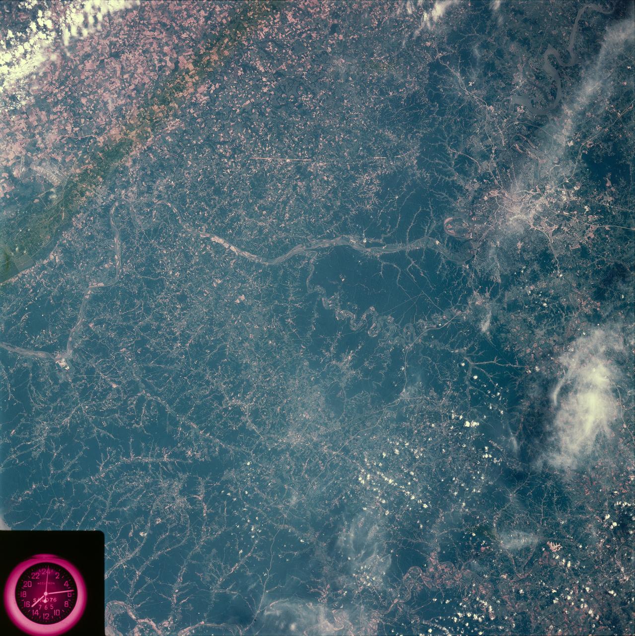 SL2-81-198 (22 June 1973) --- Making its way through the rugged Cumberland Plateau, the Cumberland River winds through the city of Nashville in north central Tennessee (36.0N, 87.0W) where the heavily forested upland terrain produces a landscape of rolling hills with elevations up to 1,100 ft. and narrow valleys. Before the advent of modern communications and transportation in this region, widely scattered and isolated communities had little contact with the outside world. Photo credit: NASA