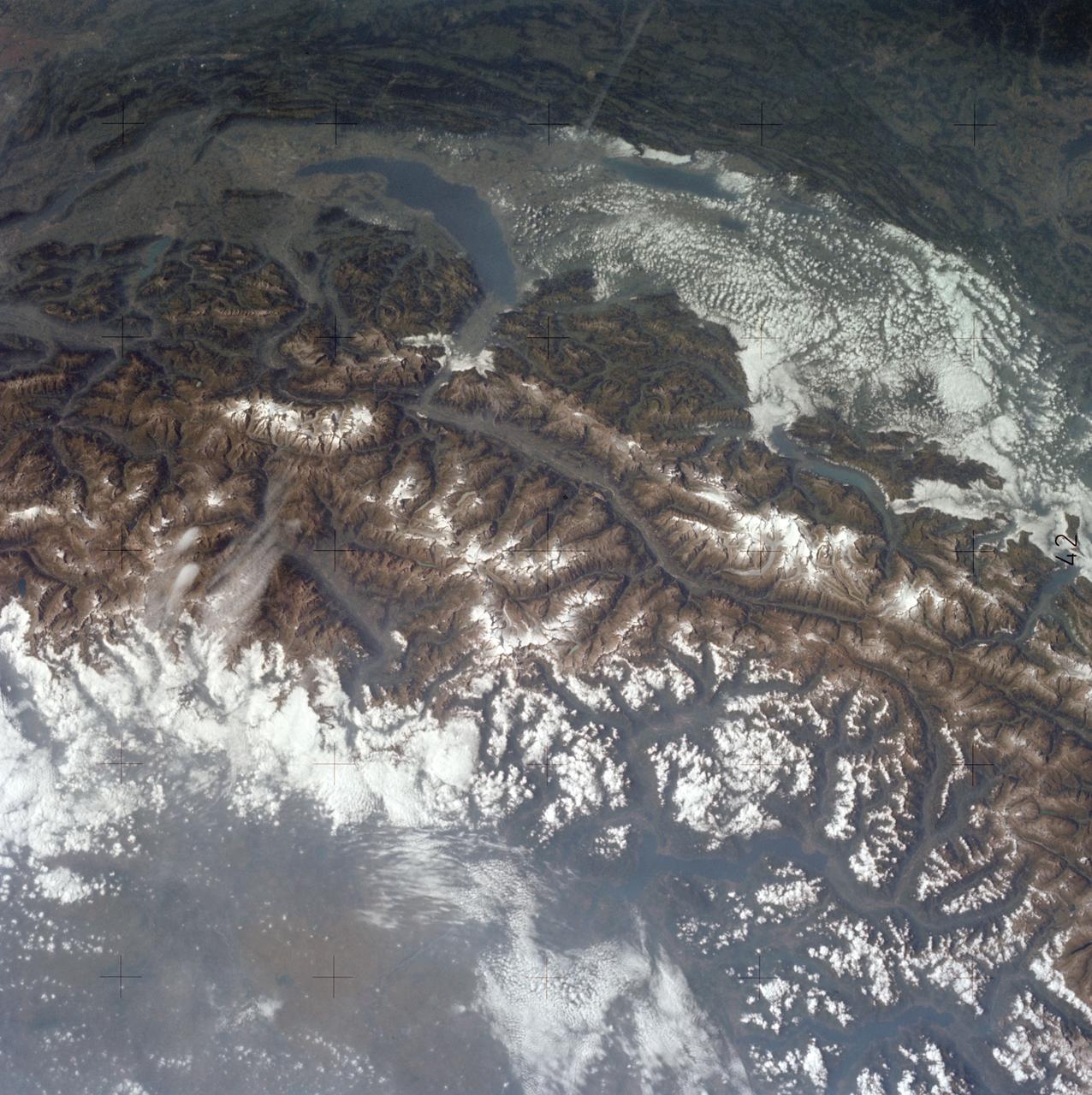 SL3-121-2438 (July-September 1973) --- The Alps of Switzerland, France and Italy are featured in this exceptional photograph taken by a hand-held camera from the Skylab space station during the second manned Skylab mission. Also visible in the out-the-window 70mm Hasselblad view are Lake Geneva, Lake of Lucerne, Rhone River and many other features. The Skylab 3 crewmen, astronauts Alan L. Bean, Owen K. Garriott and Jack R. Lousma completed a 59-day mission with a successful splashdown on Sept. 25, 1973. Photo credit: NASA