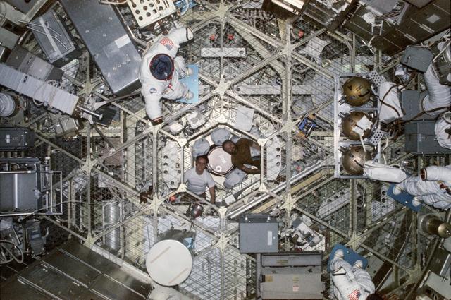NASA image: View from airlock hatch looking down length of Orbiting Workshop