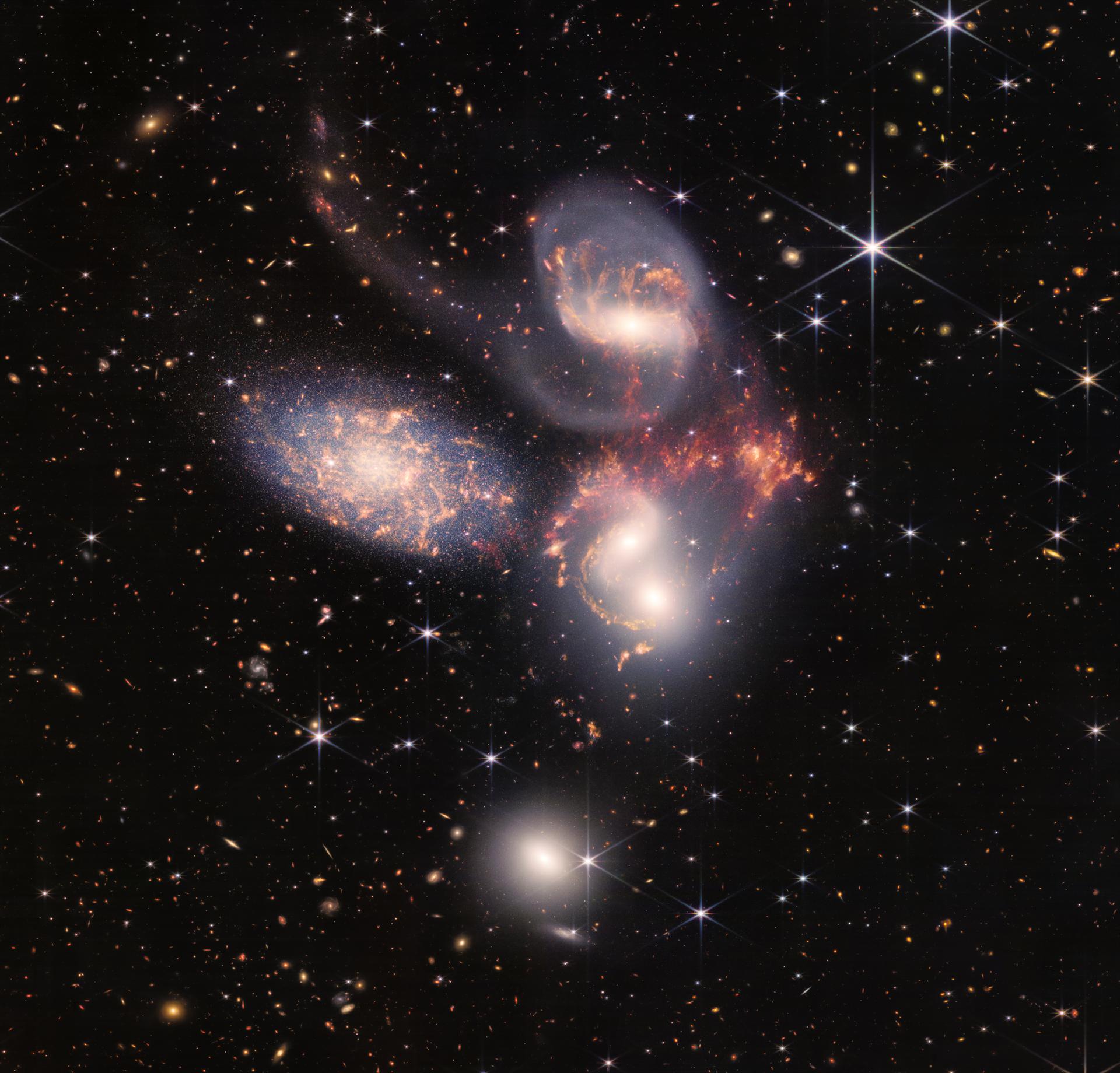 An enormous mosaic of Stephan’s Quintet is the largest image to date from NASA’s James Webb Space Telescope, covering about one-fifth of the Moon’s diameter. It contains over 150 million pixels and is constructed from almost 1,000 separate image files. The visual grouping of five galaxies was captured by Webb’s Near-Infrared Camera (NIRCam) and Mid-Infrared Instrument (MIRI).